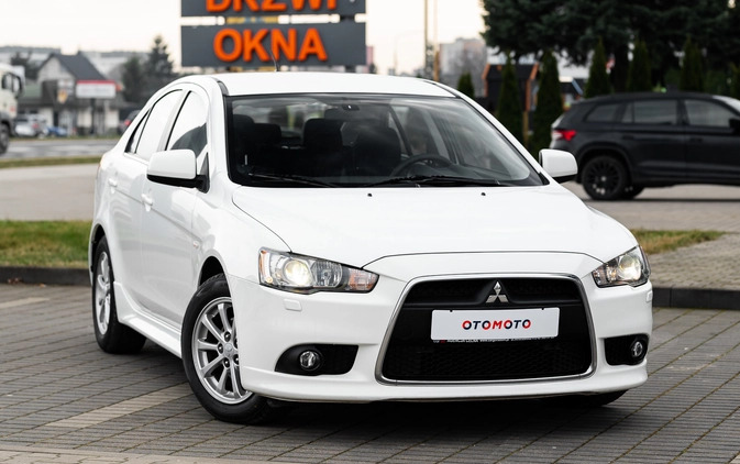Mitsubishi Lancer cena 32900 przebieg: 150000, rok produkcji 2014 z Radom małe 596